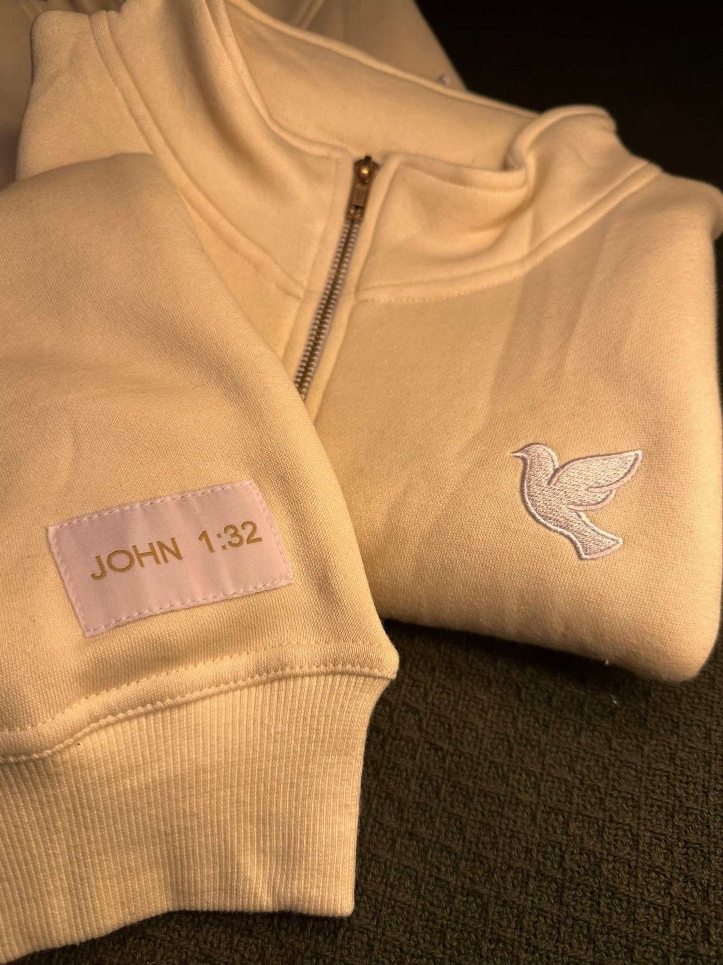 Christian quarter zip pullover with John 1:32 scripture-inspired design, soft breathable fabric, and versatile fit.